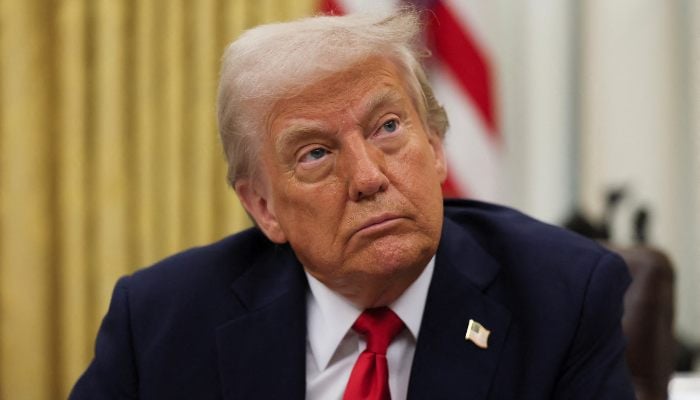 US President Donald Trump prepates to sign an executive order in the Oval Office at the White House in Washington, DC, March 31, 2025. — Reuters